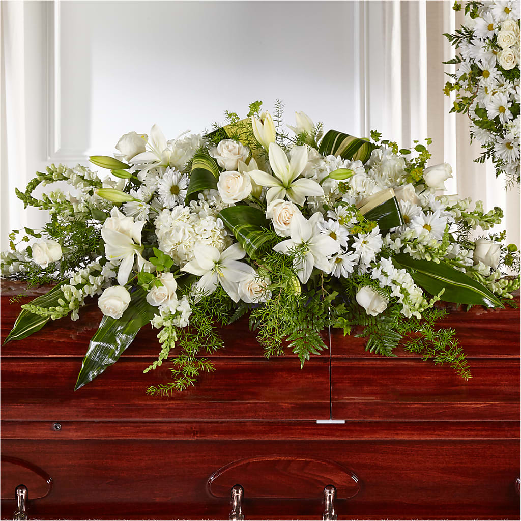 Abundance Casket Spray – Herbert E Berg Florist Inc, Worcester MA